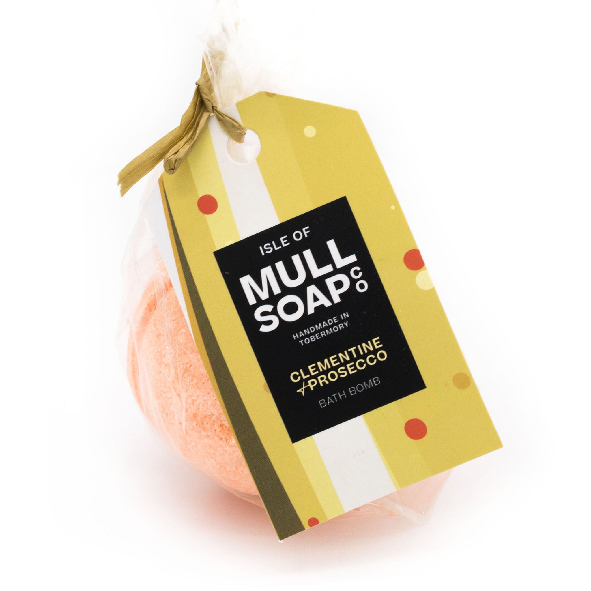 orange coloured round Clementine and Prosecco bath bomb presented as a gift in a bag with coloured tag and bow. Handmade by the Isle of Mull soap co in Tobermory, Scotland. 
