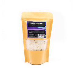 Kraft display bag with window containing  mull heather bath salts. white with heather flowers through them. handmade in Tobermory by the Isle of Mull soap co.