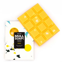 A yellow Daisy perfume scented soy wax melt snap bar white tiny flowers sprinkled in. Handmade in Tobermory by the Isle of Mull Soap Co.
