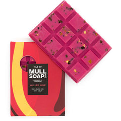 A deep red Mulled wine scented soy wax melt snap bar with spices sprinkled in. Handmade in Tobermory by the Isle of Mull Soap Co.